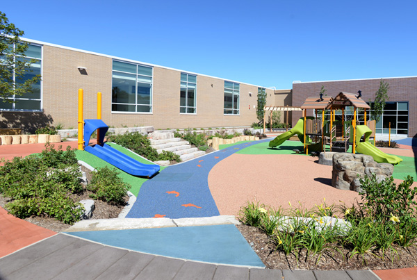 The CCSD59 Early Learning Center surrounds a central courtyard where children can safely play while their parents mingle in the corridor and welcome center.