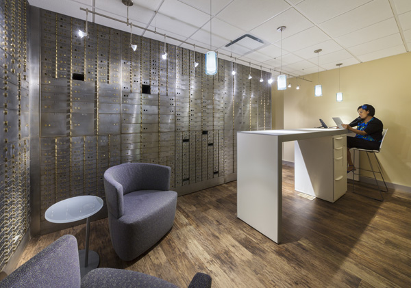 Old safe deposit boxes line a staff lounge at the Erie HealthReach Waukegan Health Center.