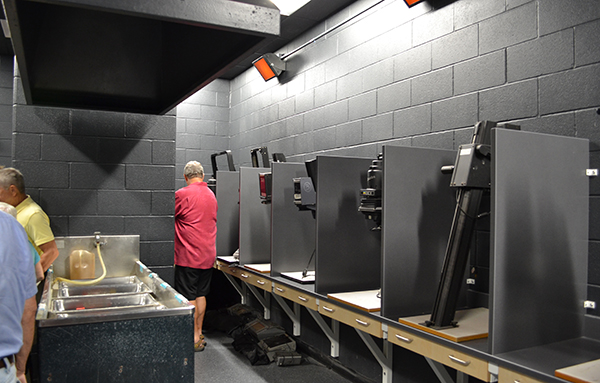 The addition includes a new photo room filled with natural light, as well as an editing area and a traditional dark room (pictured) for processing film.