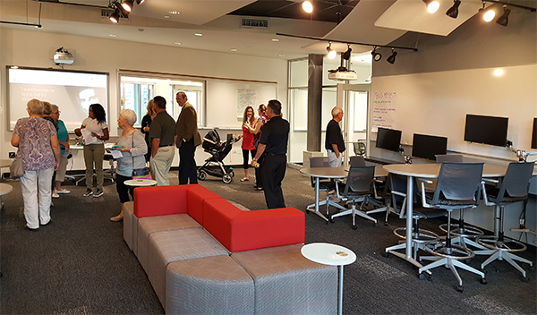 Guests explore the Business Incubator where students build their entrepreneurial skills.