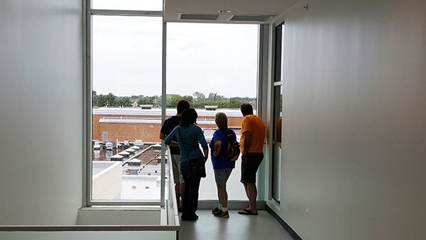 A Mundelein family enjoys the view from one of many corridor socialization areas.