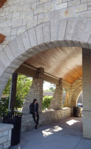 At the rehabilitated La Grange Stone Avenue Train Station, strong materials and built-in benches create a welcoming impression.