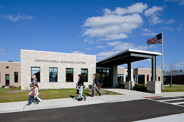 Warm materials create a welcoming entry at the Addison Early Learning Center.