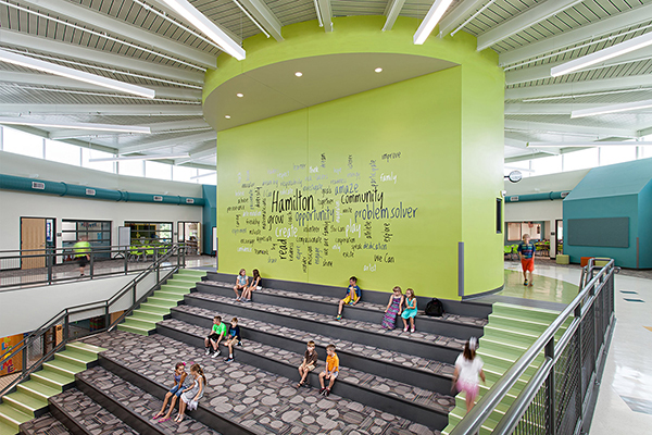 A Learning Stair encourages spontaneous interaction and hosts presentations.