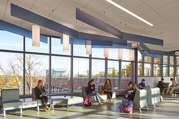 Each floor within the glass bridge offers a collaboration node with technology connections and views of the campus.