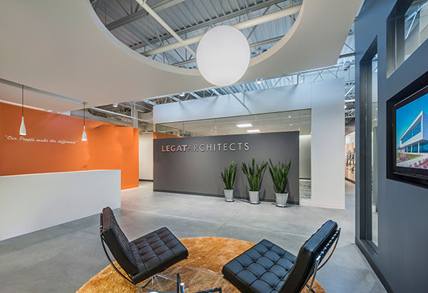 Though a contemporary aesthetic dominates the lobbys shag rug and globe light offer a playful throwback to the firms original studio Though a contemporary aesthetic dominates the lobbys shag rug and globe light offer a playful throwback to the firms original studio