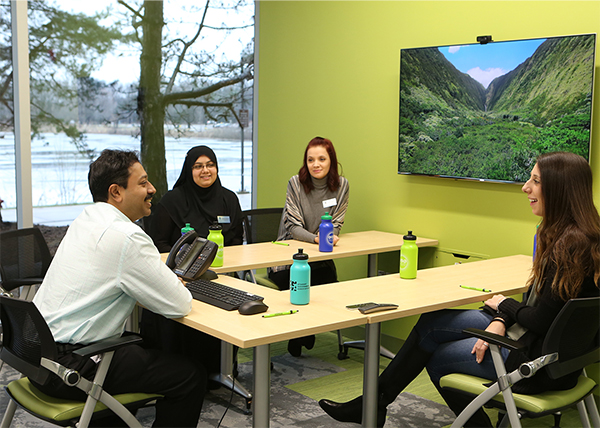 Both the open space and private meeting spaces offer views to Oakton’s campus, which is located in the middle of a forest preserve.