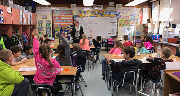 architect speaking to elementary school students