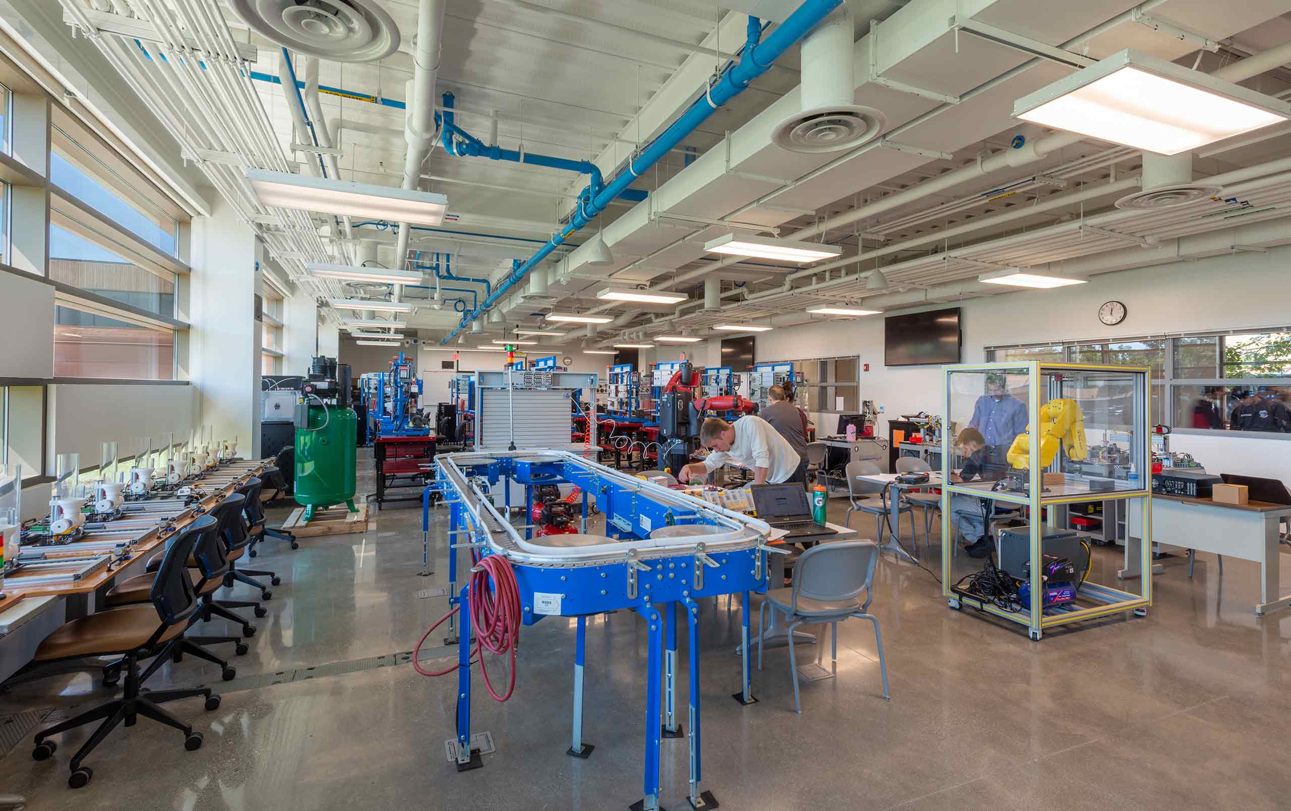 Students working mechatronics lab within College of Lake County Science & Advanced Technologies Building