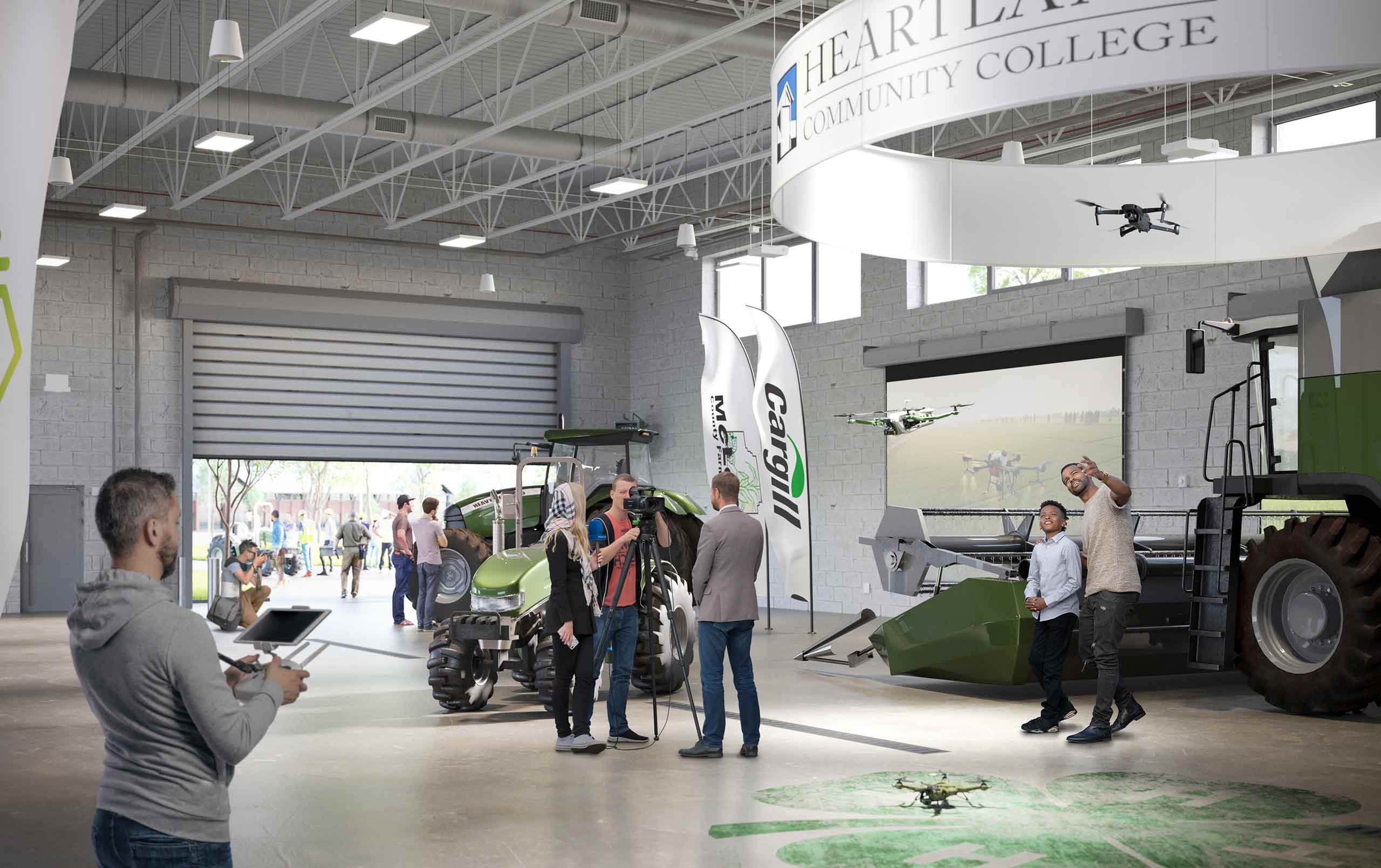 People filming and flying drones in lab at Heartland Community College Net Zero Agricultural Complex