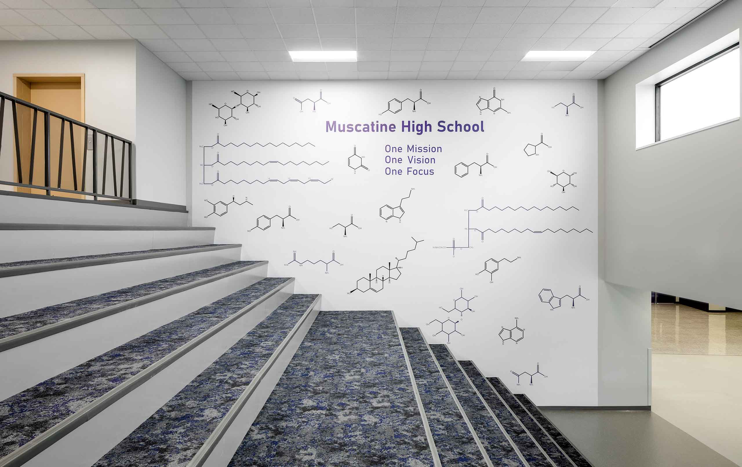 Muscatine High School science expansion learning stair with wall decals