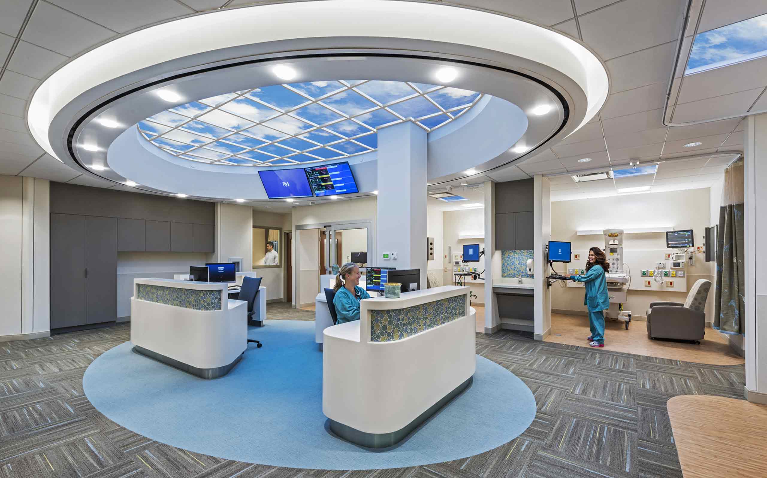 nurses at the front desk station