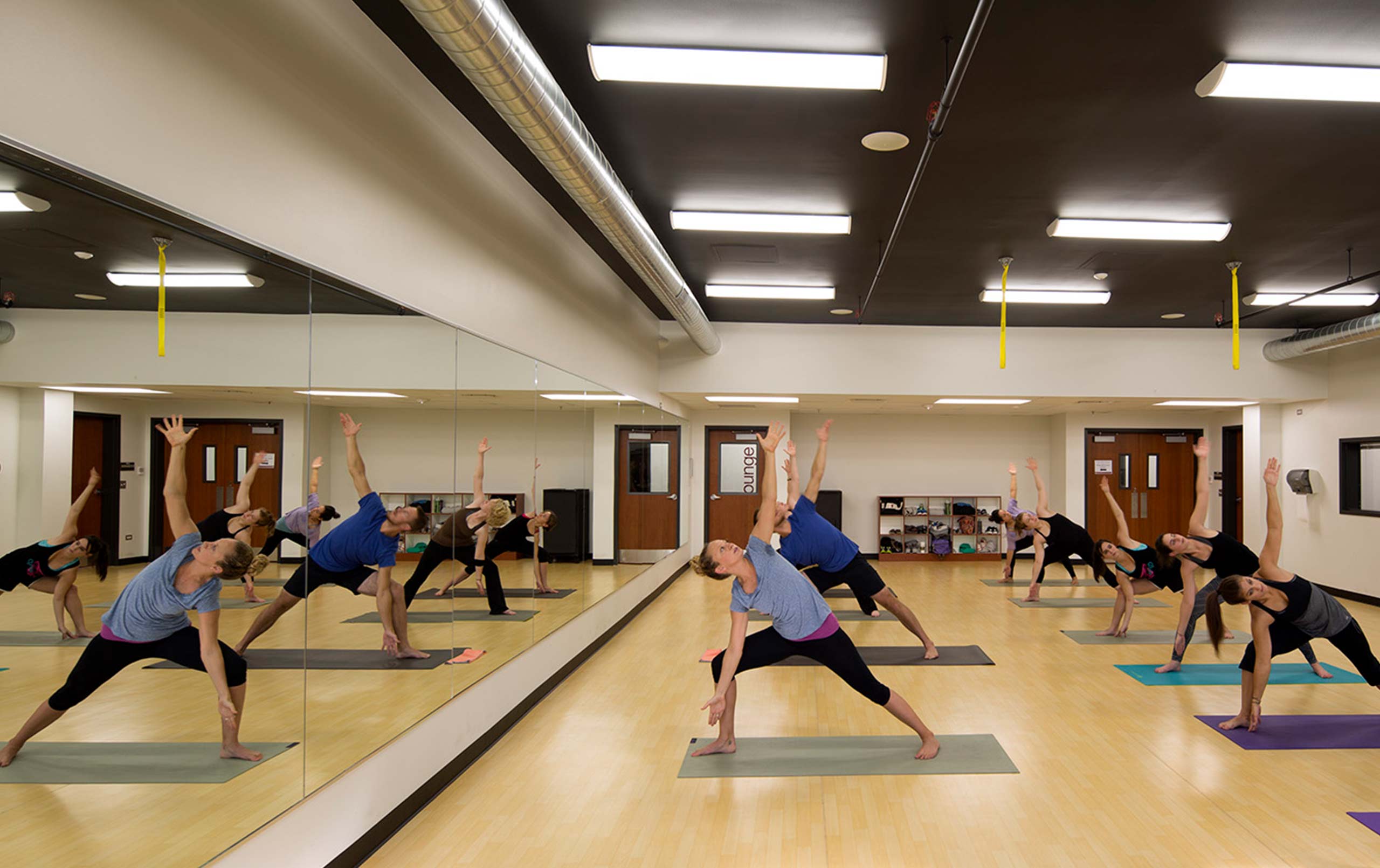 Students in a yoga class at Rosalnd Franklin University Centennial Learning Building. 