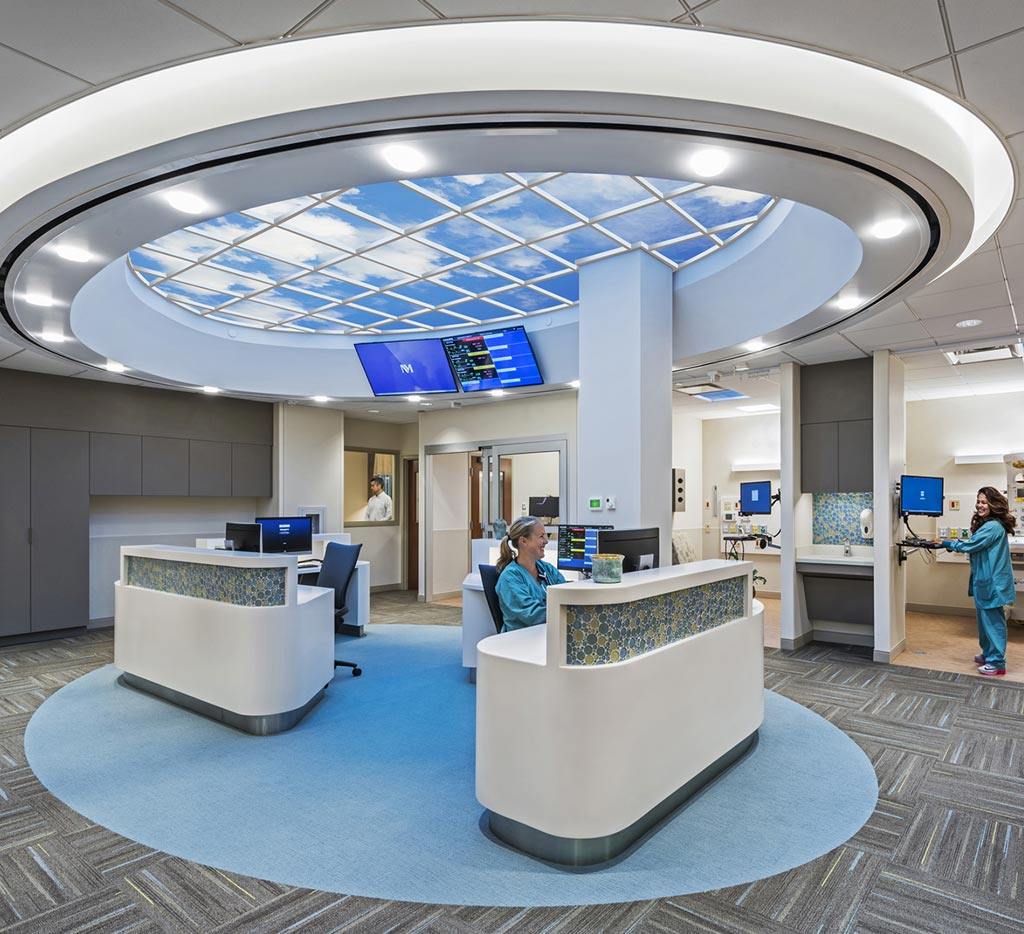 Healthcare ICU nurse station with elliptical ceiling feature showing artificial sky