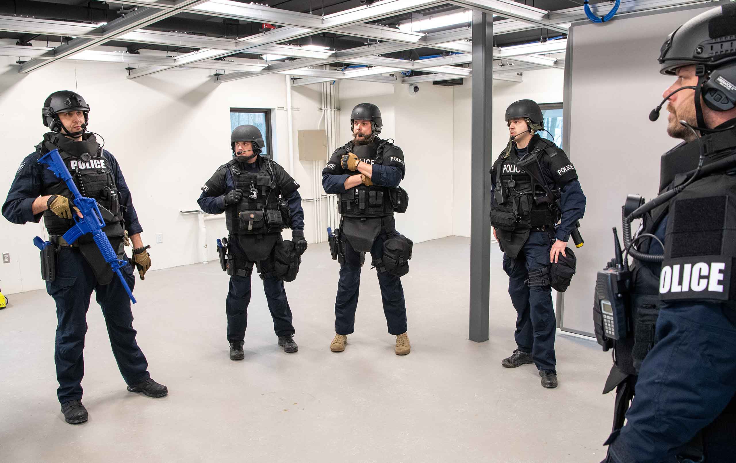 Law enforcement trainees prepare for simulated exercise