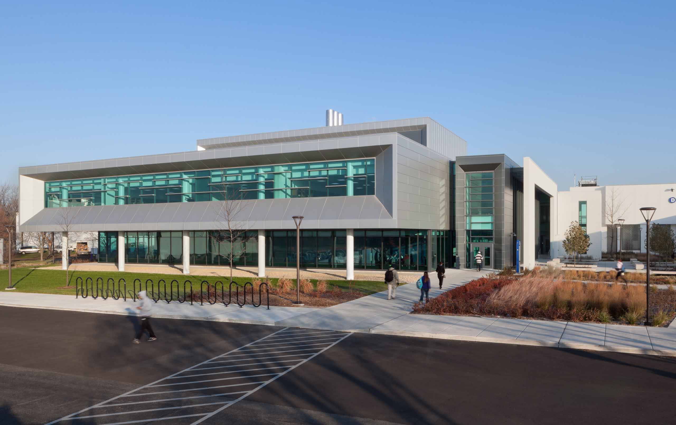 Higher education building exterior showing windows surrounded by metal frame