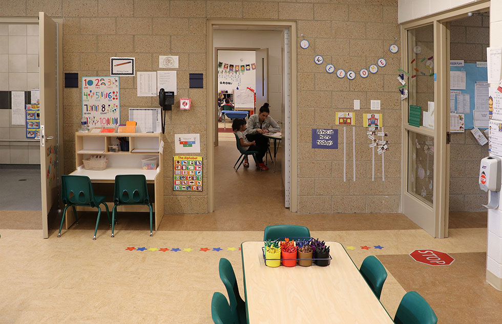 Bathroom and breakout space between two kindergarten classrooms
