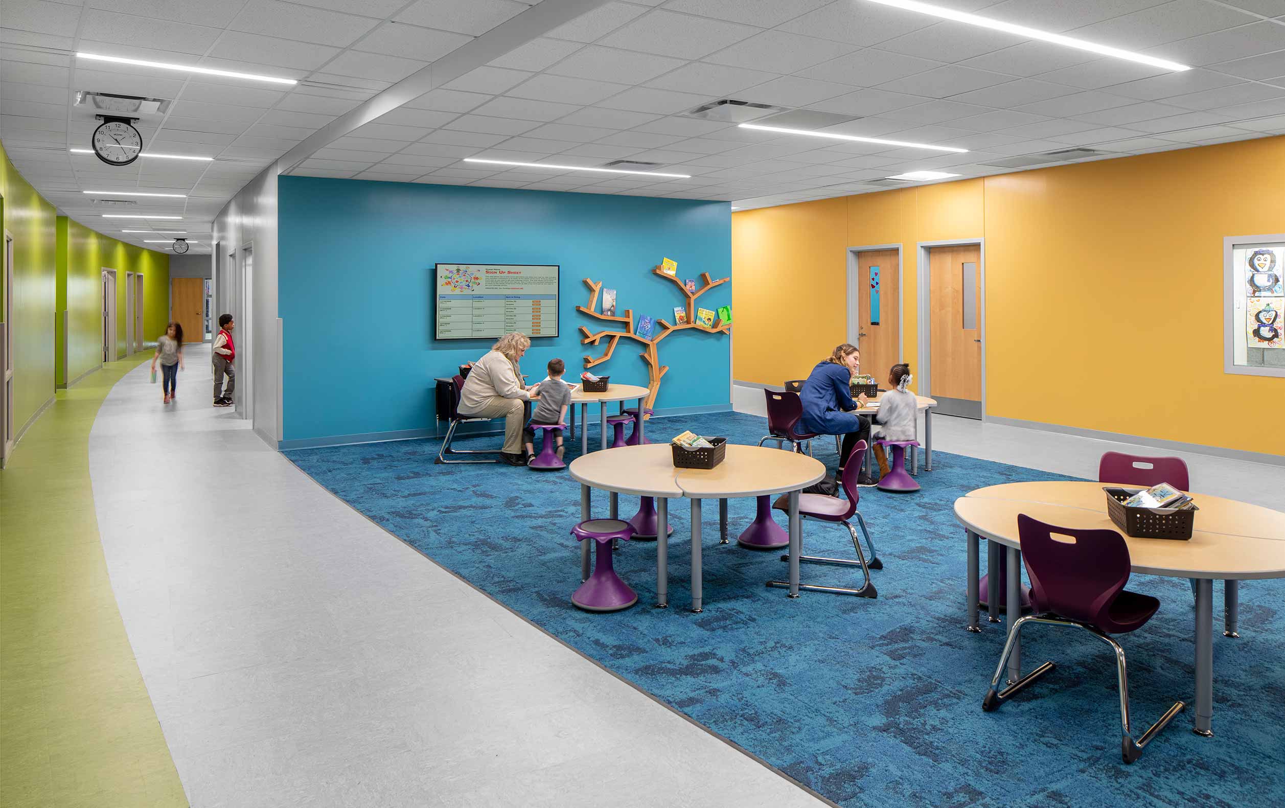 Colorful curving school corridor with students