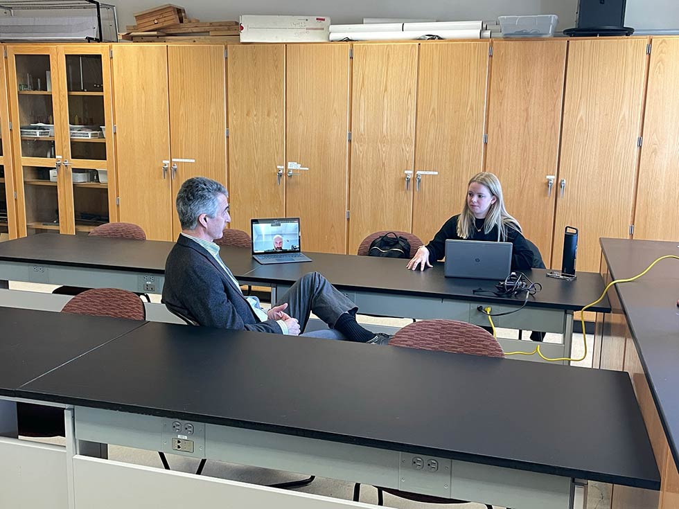 Professor Peter Betz (interviewee) and Legat's Aileen Everitt meeting in traditional lab.