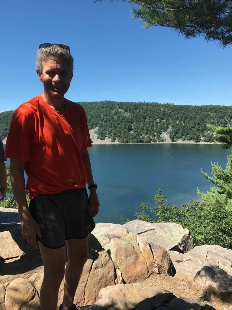 Ted Haug with Devil's Lake in background