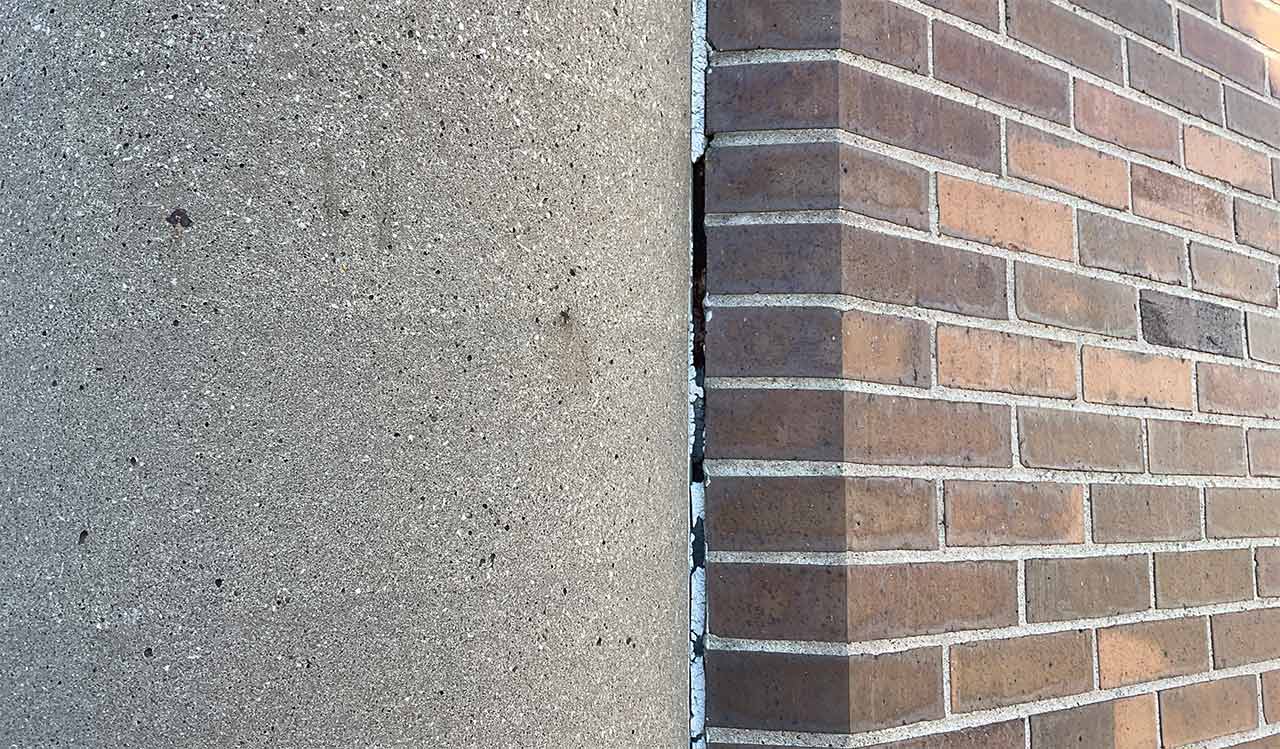 Brick wall with deteriorating sealant