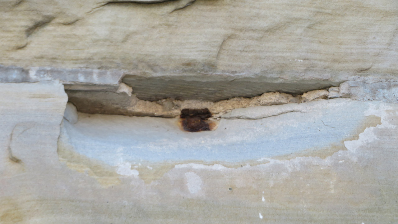 Close-up of decaying mortar in masonry wall