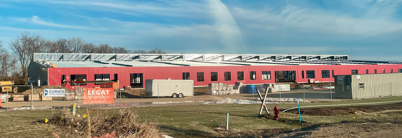 Exterior view of long, one-story facility