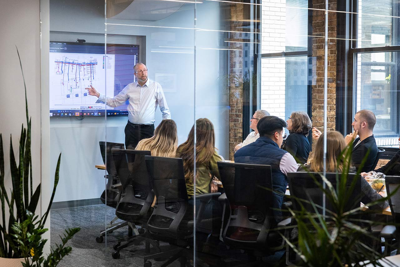 Architect giving presentation in studio