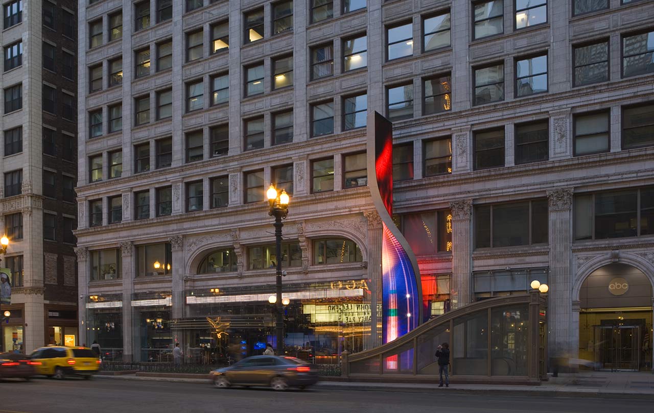 History Chicago facade with glowing, curving video sculpture