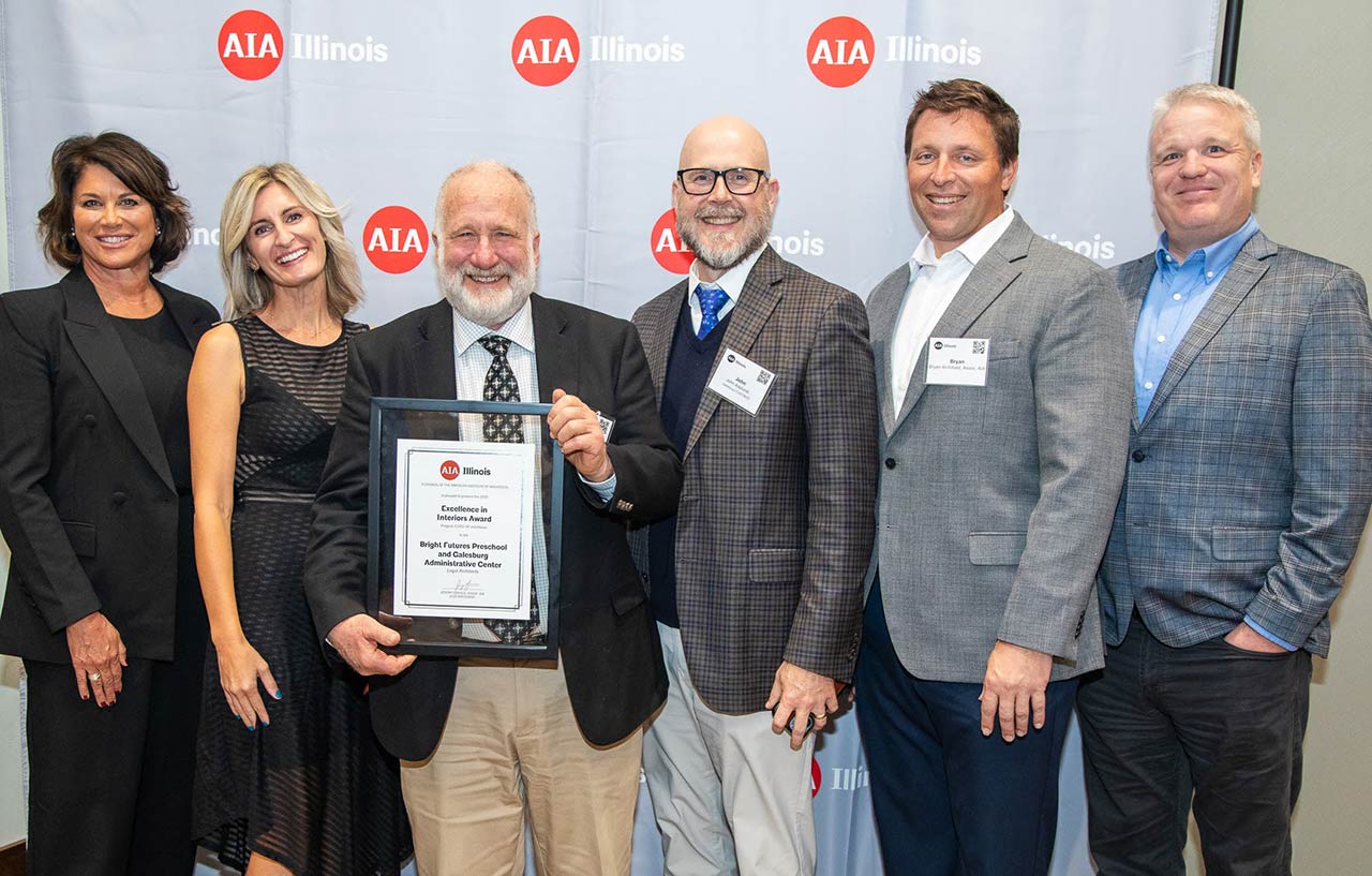 Group posing with American Institute of Architects Illinois chapter Honor Award