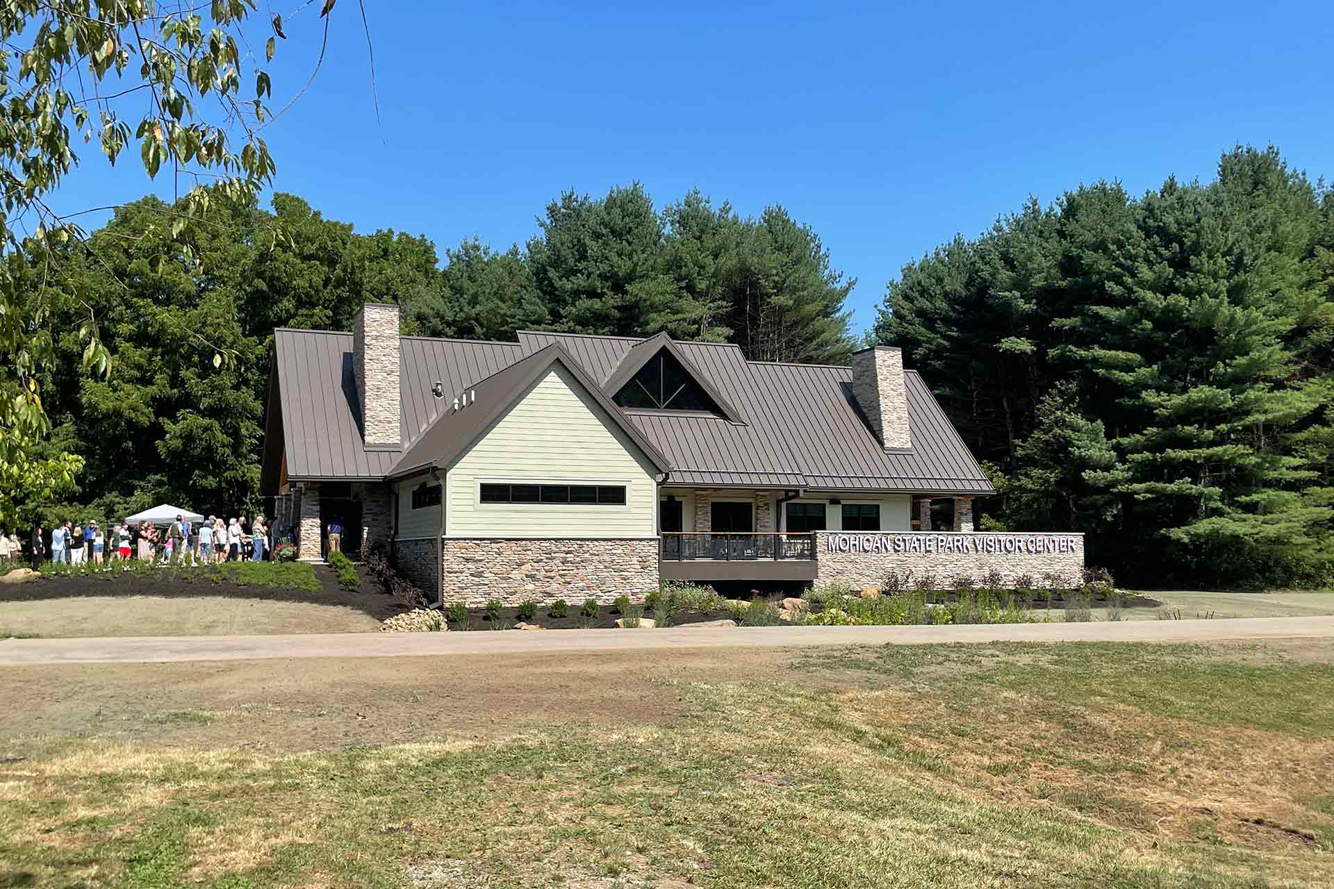 Exterior view showing different building materials and patio