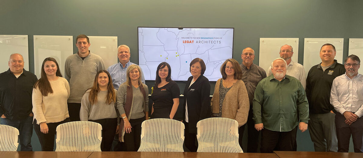 Architecture team lined up in conference room