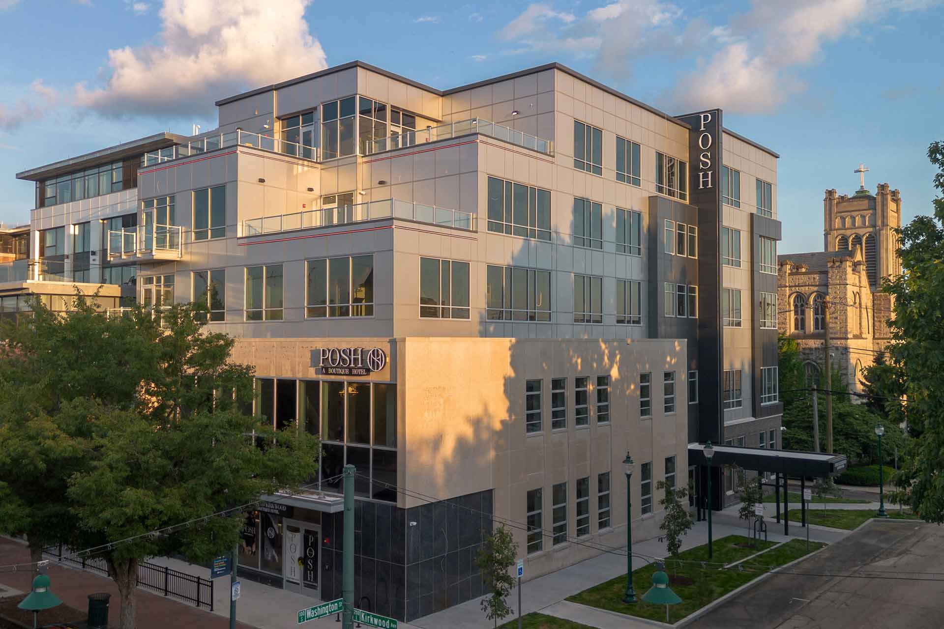 Hotel with limestone and metal facade, built on top of historic bank