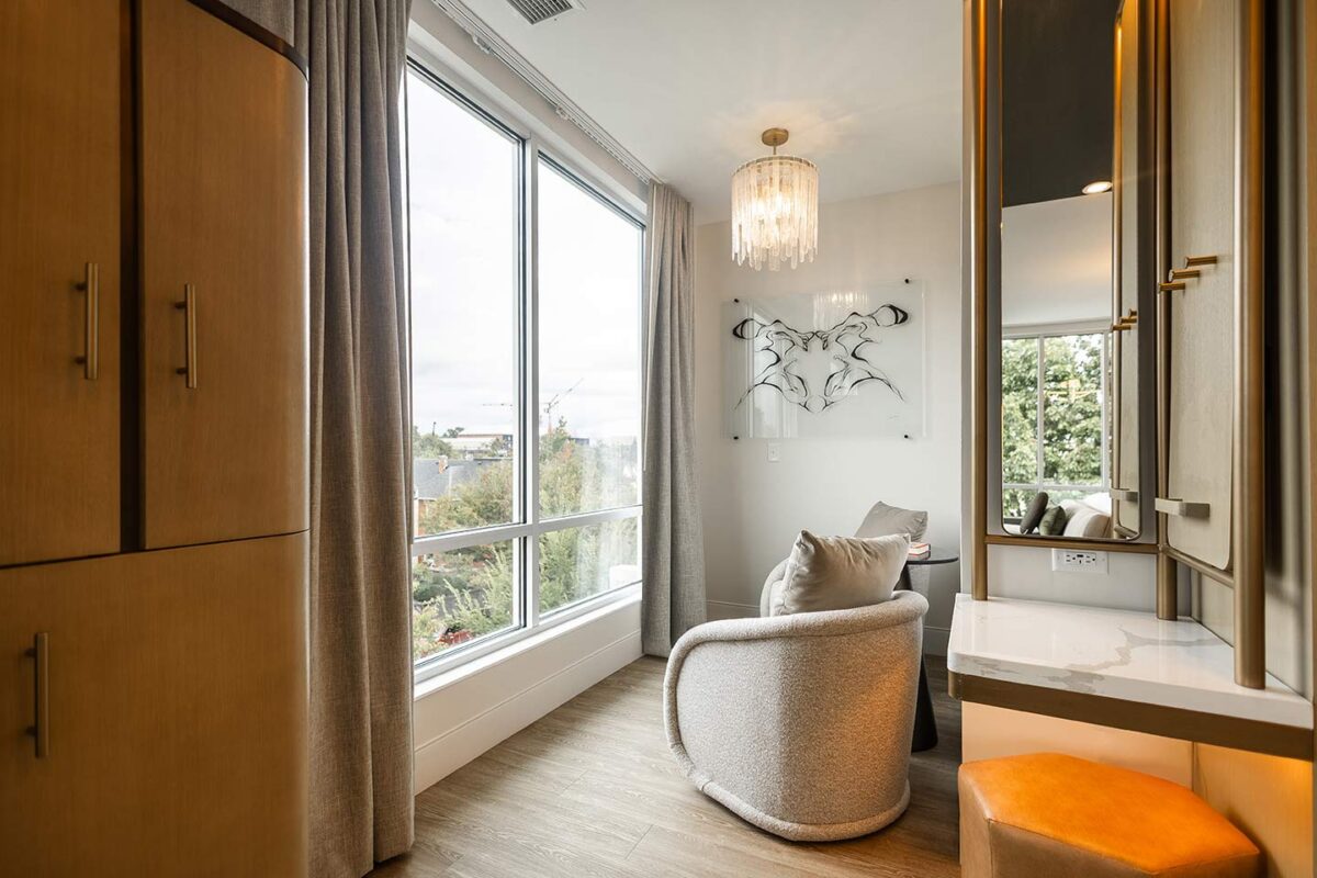 Hotel king studio with modern furnishings and views of trees 