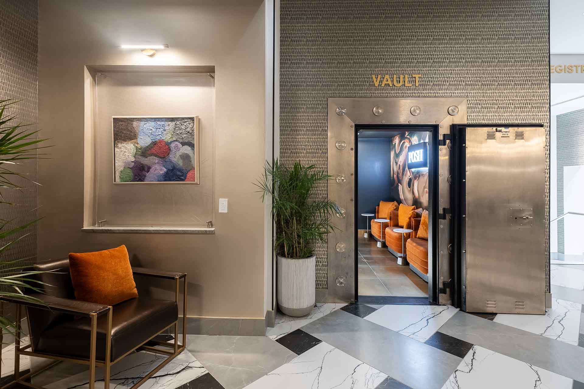 Entry into bank vault transformed into hotel gathering space