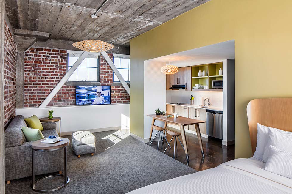 Retrofitted hotel room showings parts of original facility