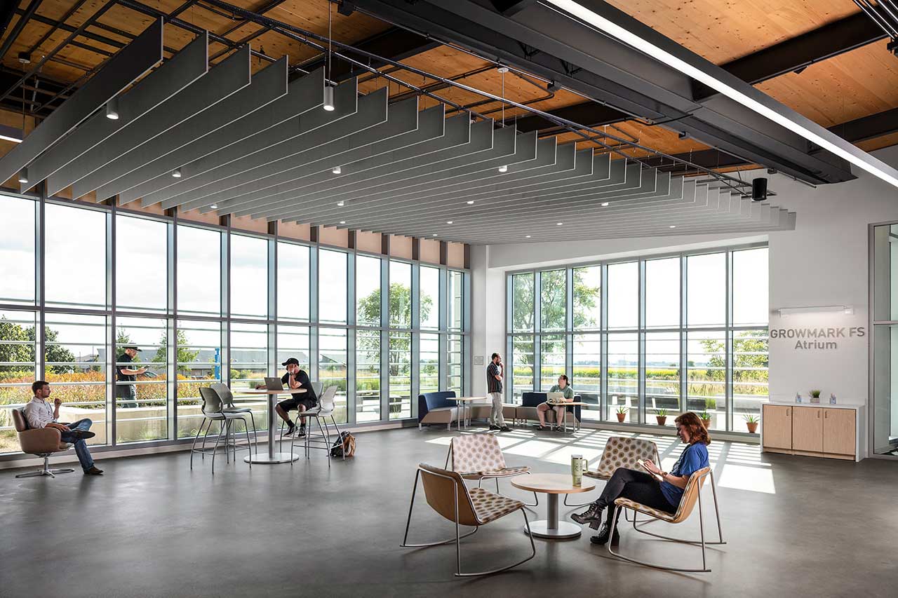 Higher education student gathering with wood ceilings and views to adjacent farmland.