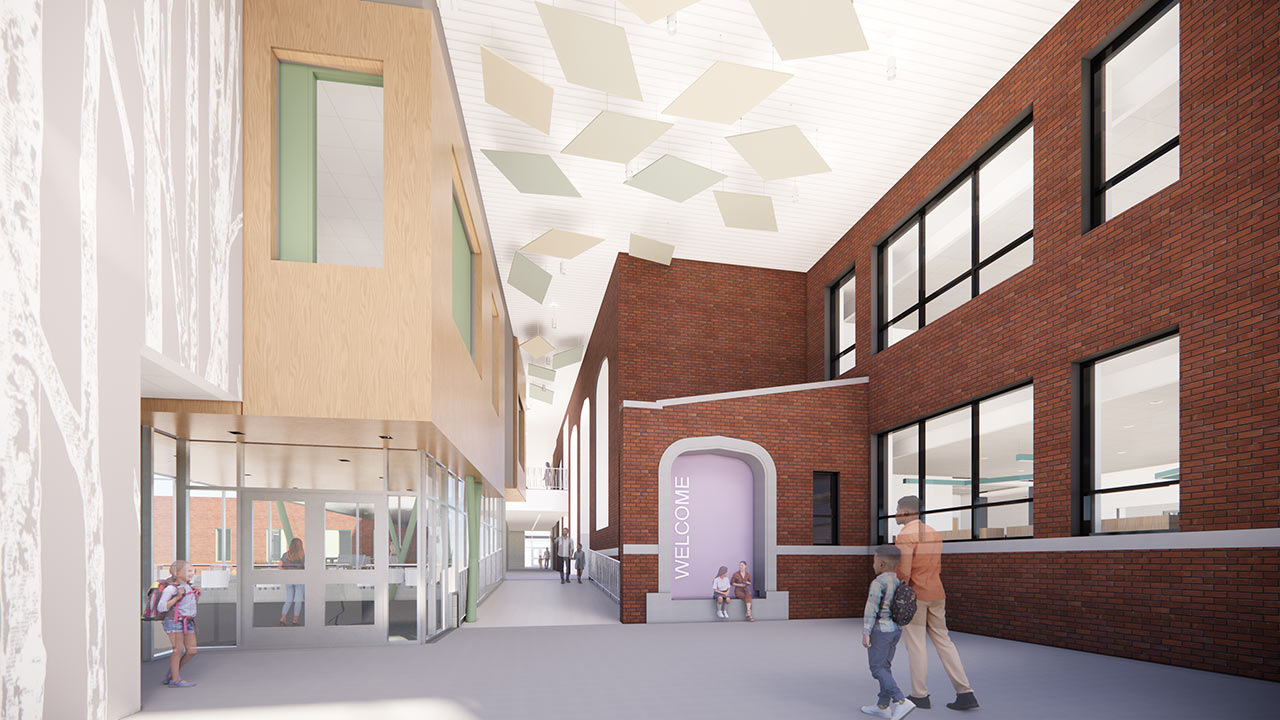 Architectural rendering of the renovated Harrison Elementary School in Cedar Rapids, Iowa, showing a light-filled atrium that blends historic red brick with modern learning spaces.